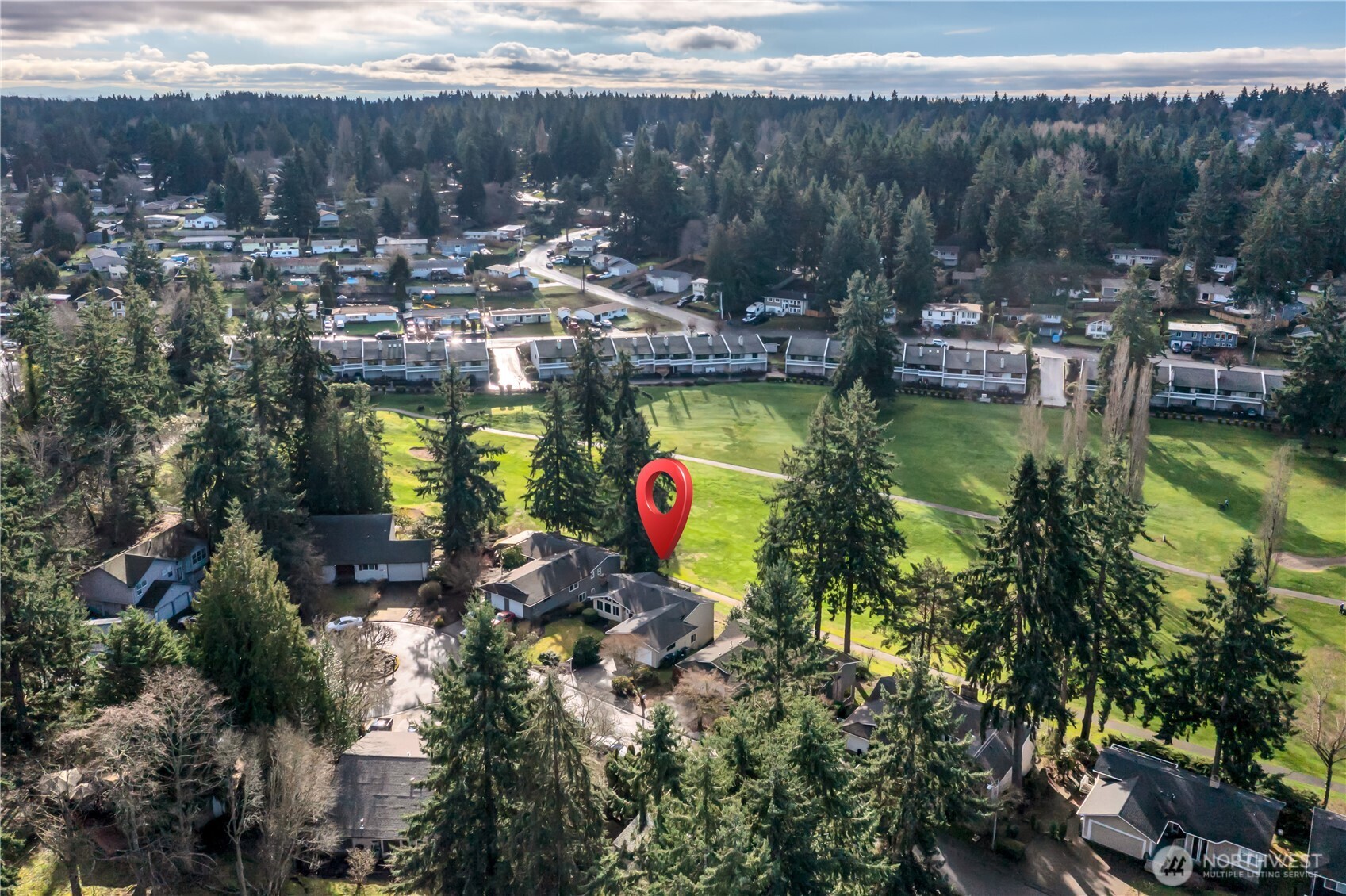 32417 29th Avenue Southwest Federal Way, WA 98023 - Photo 37 of 39 a aerial view of a house with swimming pool and lake view