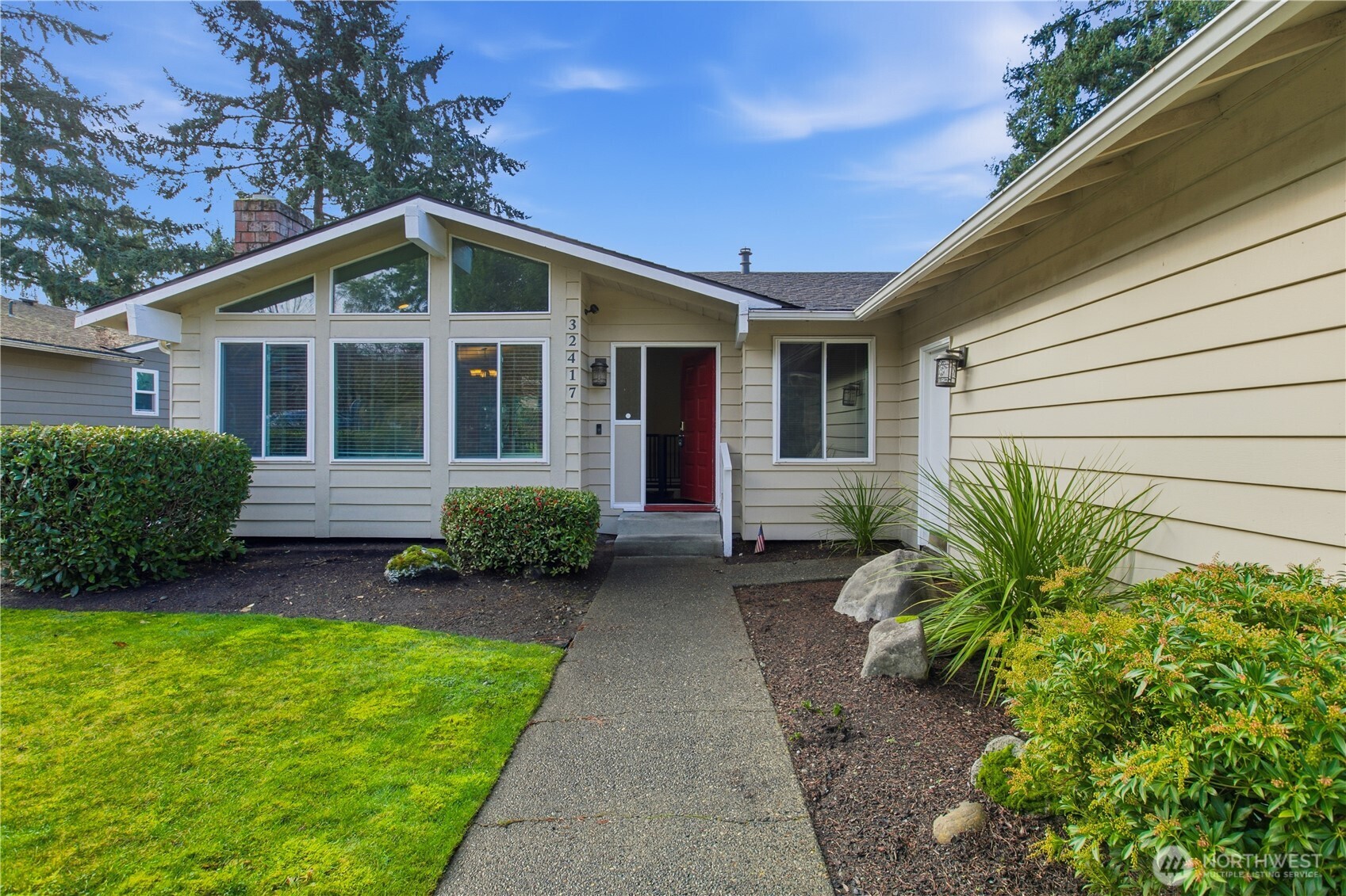 32417 29th Avenue Southwest Federal Way, WA 98023 - Photo 4 of 39 a view of a house with a small yard plants and large tree