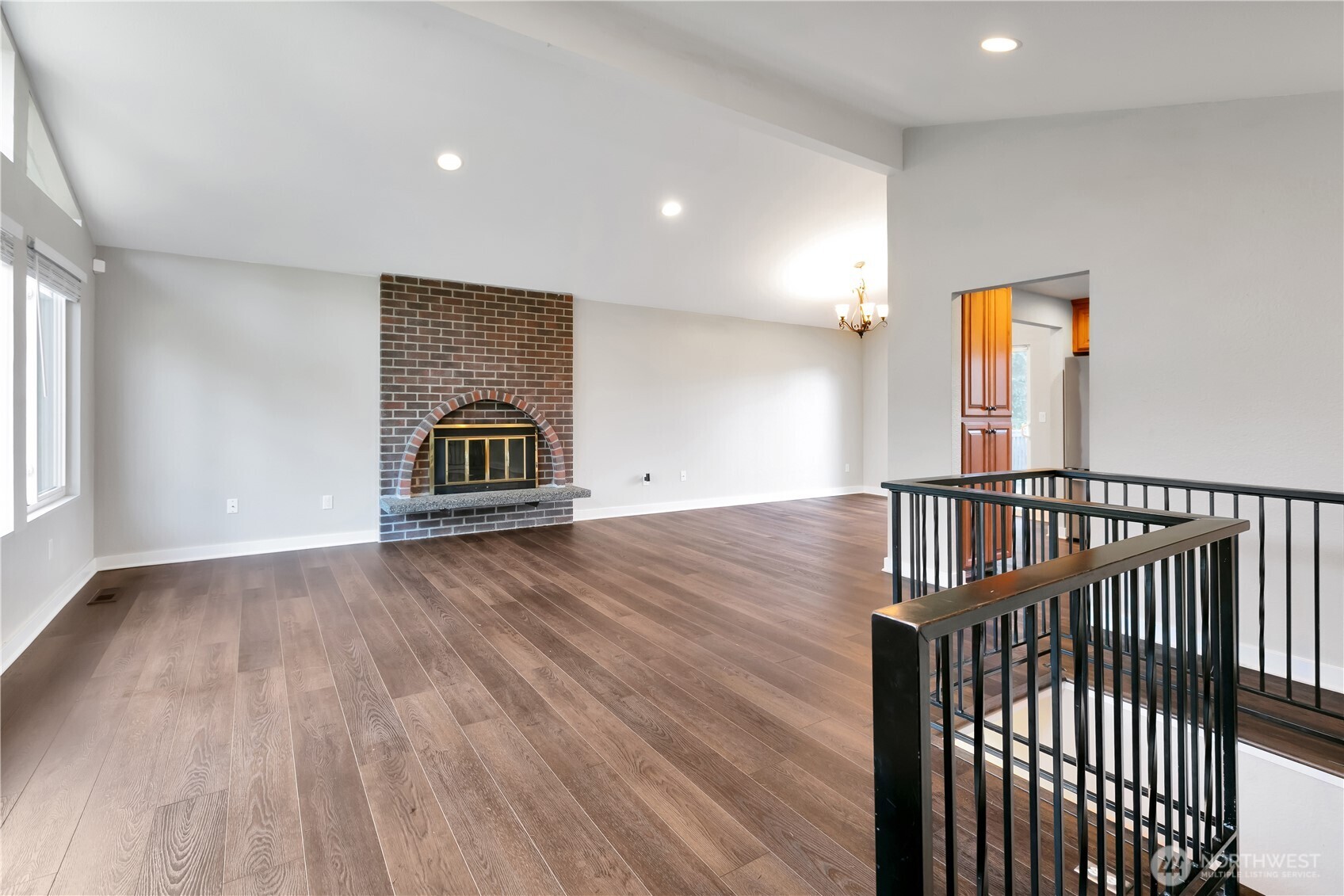 32417 29th Avenue Southwest Federal Way, WA 98023 - Photo 5 of 39 a view of a hallway with wooden floor