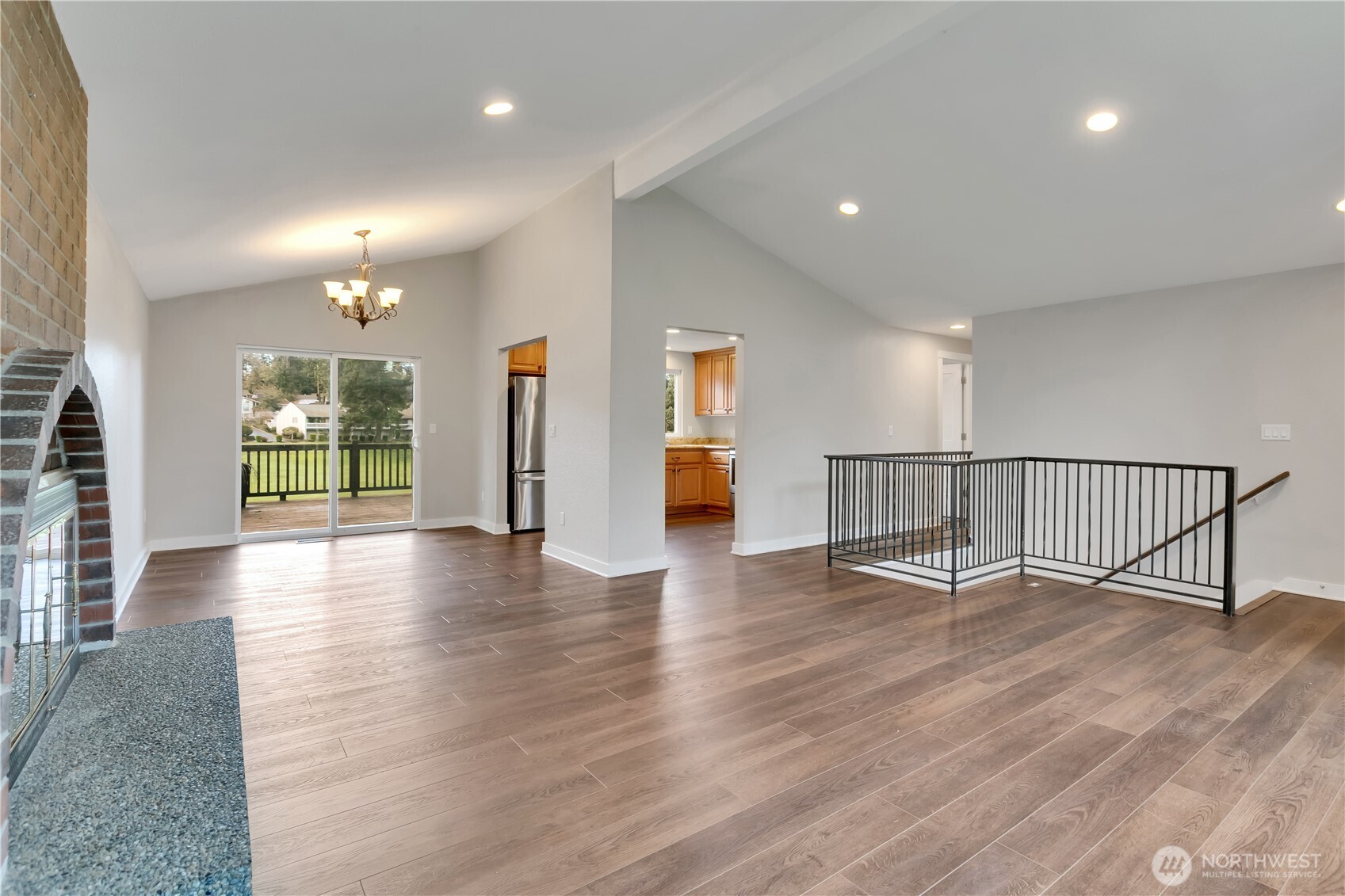 32417 29th Avenue Southwest Federal Way, WA 98023 - Photo 7 of 39 a view of a hall with wooden floor and windows