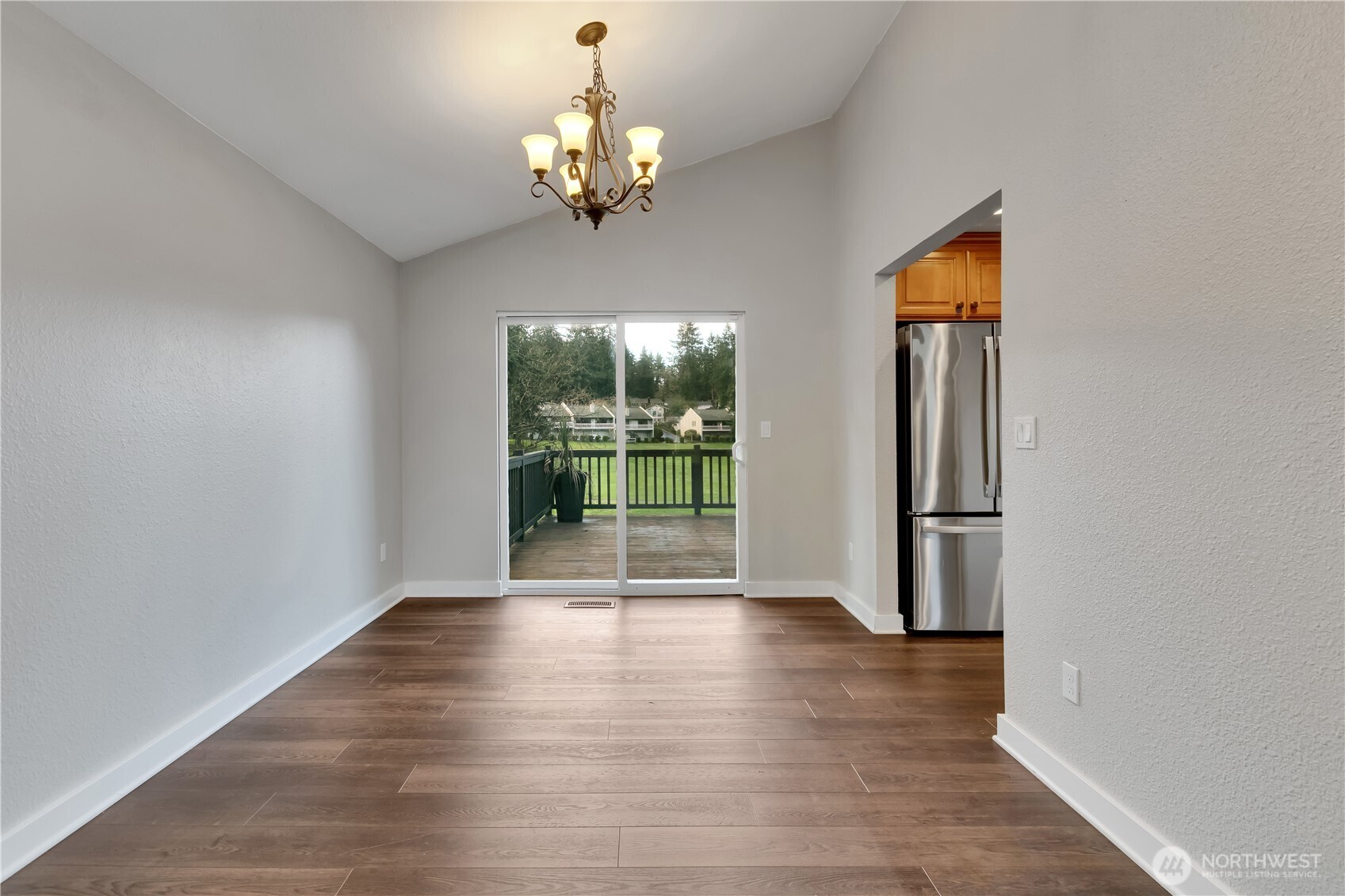 32417 29th Avenue Southwest Federal Way, WA 98023 - Photo 9 of 39 a view of livingroom with chandelier and wooden floor