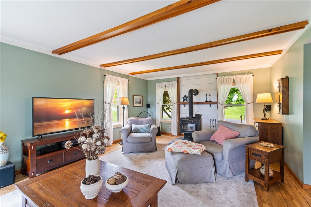 8145 Dutch Street Road Huron, NY 14590 - Photo 24 of 50 Large family room with wood burning woodstove