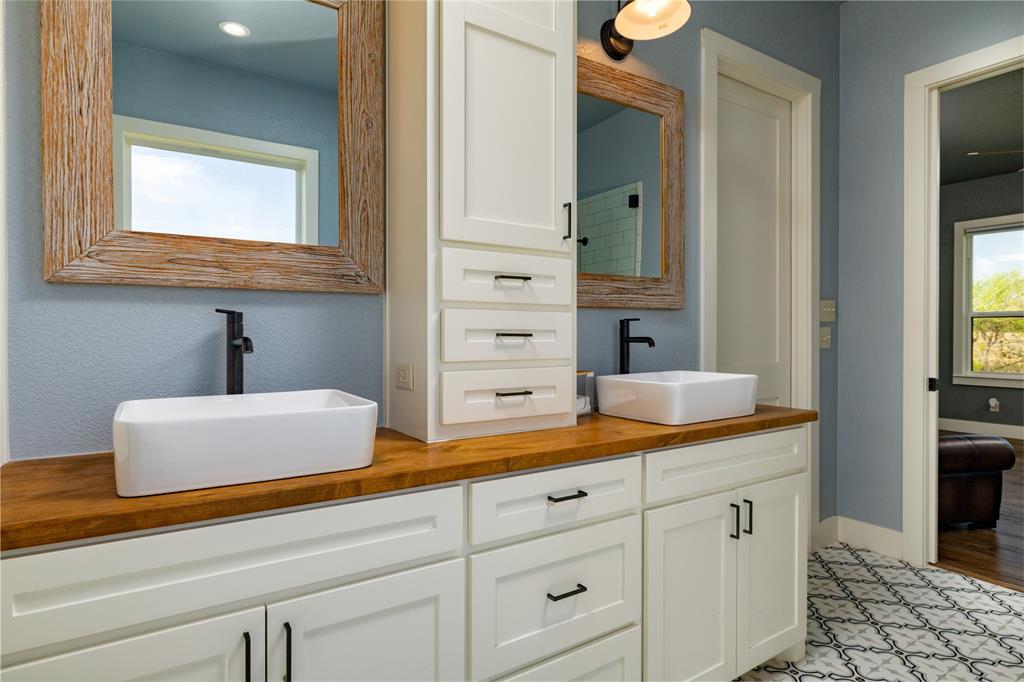 338 County Road 4223 Decatur, TX 76234 - Photo 24 of 37 Primary Bathroom dual vanity