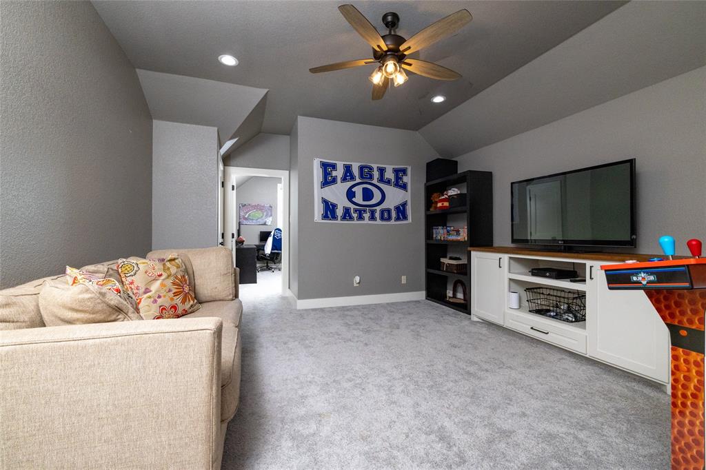 338 County Road 4223 Decatur, TX 76234 - Photo 31 of 37 Upstairs Game Room toward Bedroom 3 of 4. A walk-in storage closet, not in view, is also located off of the Game Room.