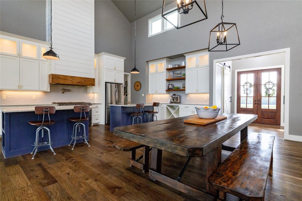 338 County Road 4223 Decatur, TX 76234 - Photo 8 of 37 Kitchen and Dining Area from the Living Room fireplace