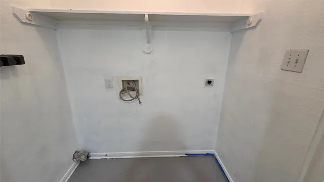 a view of small space with racks on the wall