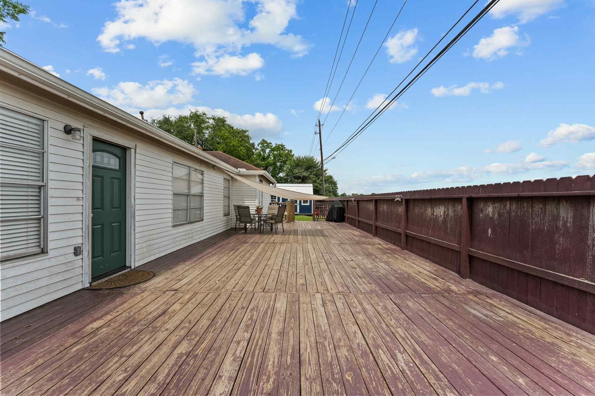 2102 North Pearland Avenue Pearland, TX 77581 - Photo 25 of 29 a view of a balcony with wooden floor