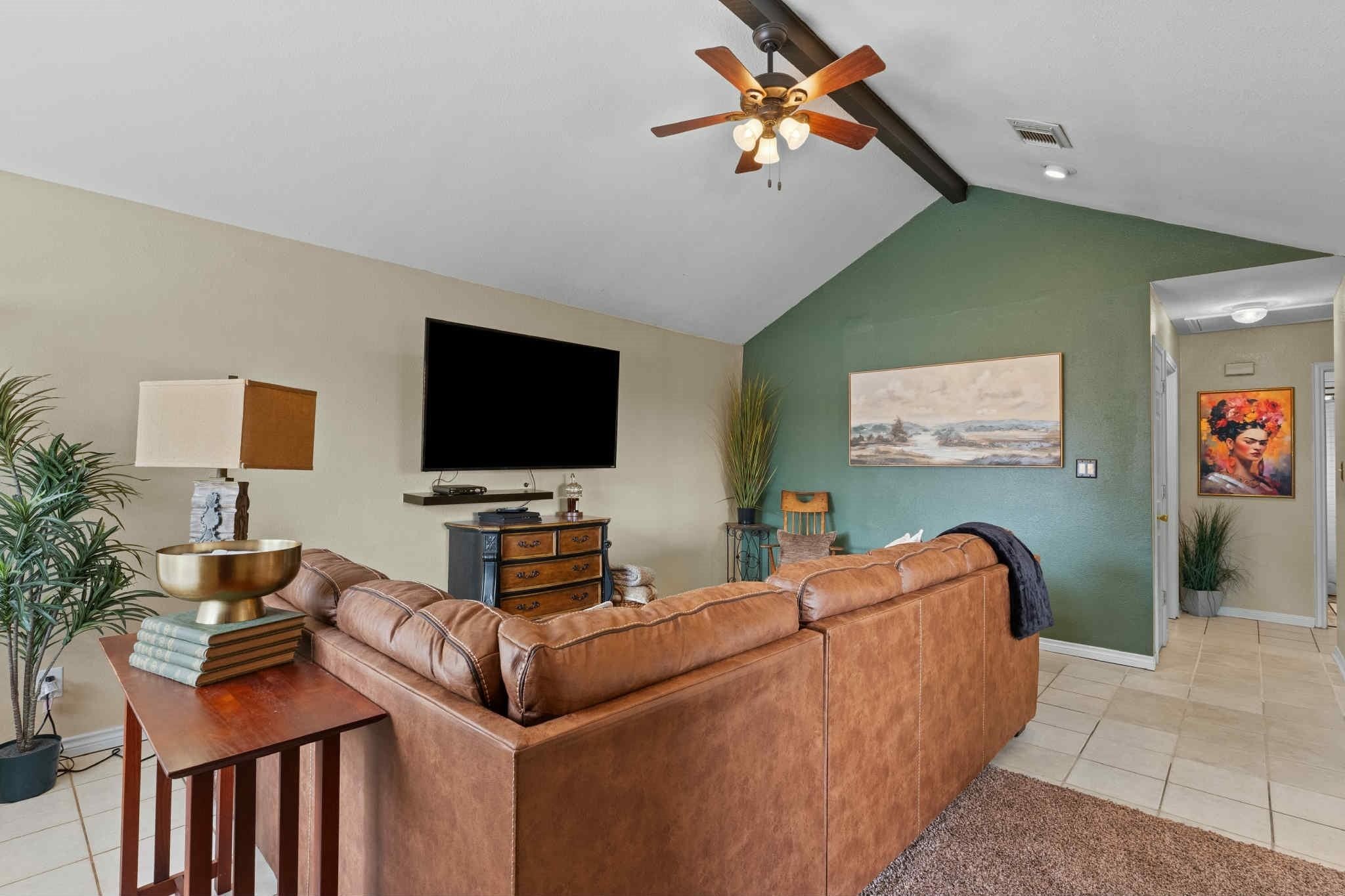 2102 North Pearland Avenue Pearland, TX 77581 - Photo 9 of 29 a living room with furniture and a flat screen tv