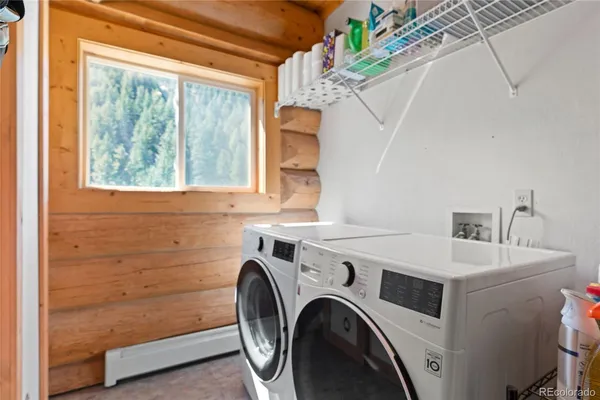 a utility room with dryer and washer