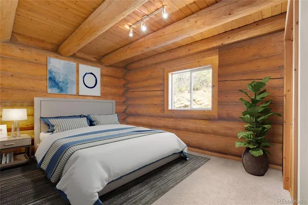 a bedroom with a bed and a potted plant