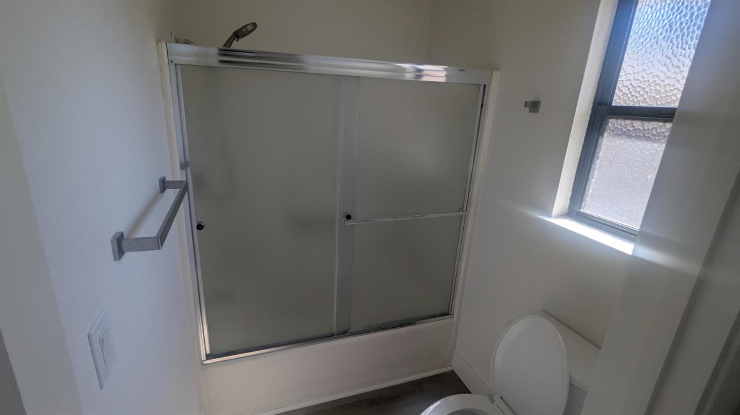 6851 Albury Street Citrus Heights, CA 95621 - Photo 14 of 22 a bathroom with a shower and toilet