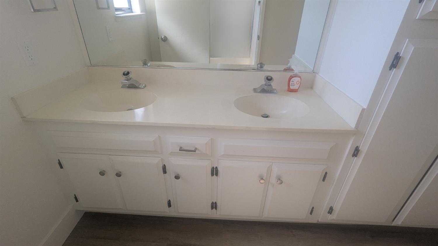 6851 Albury Street Citrus Heights, CA 95621 - Photo 15 of 22 a bathroom with a sink and a mirror