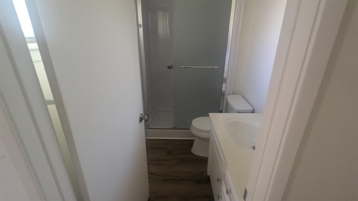 6851 Albury Street Citrus Heights, CA 95621 - Photo 18 of 22 a bathroom with a white toilet and sink