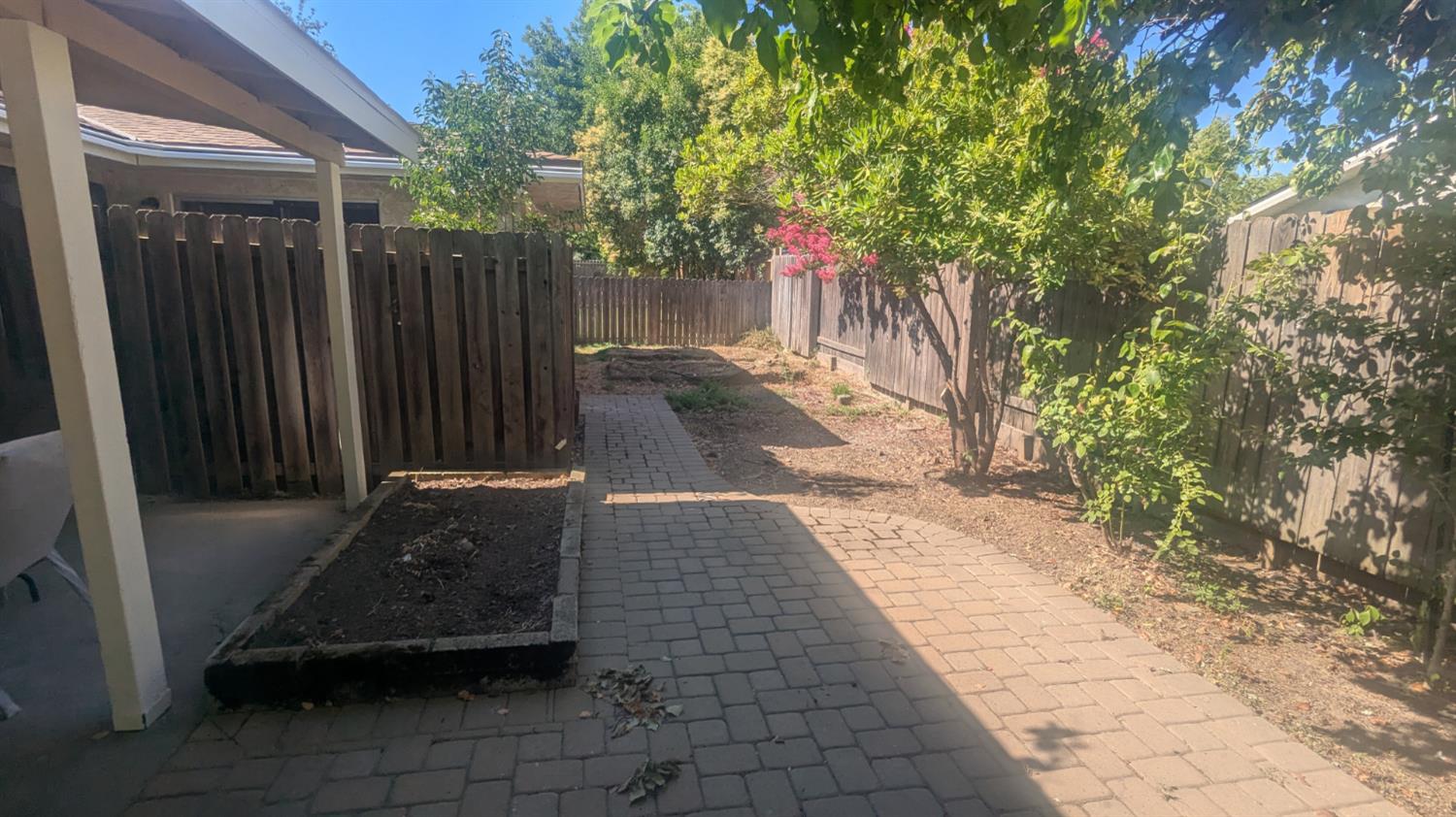 6851 Albury Street Citrus Heights, CA 95621 - Photo 20 of 22 a view of a backyard with pathway