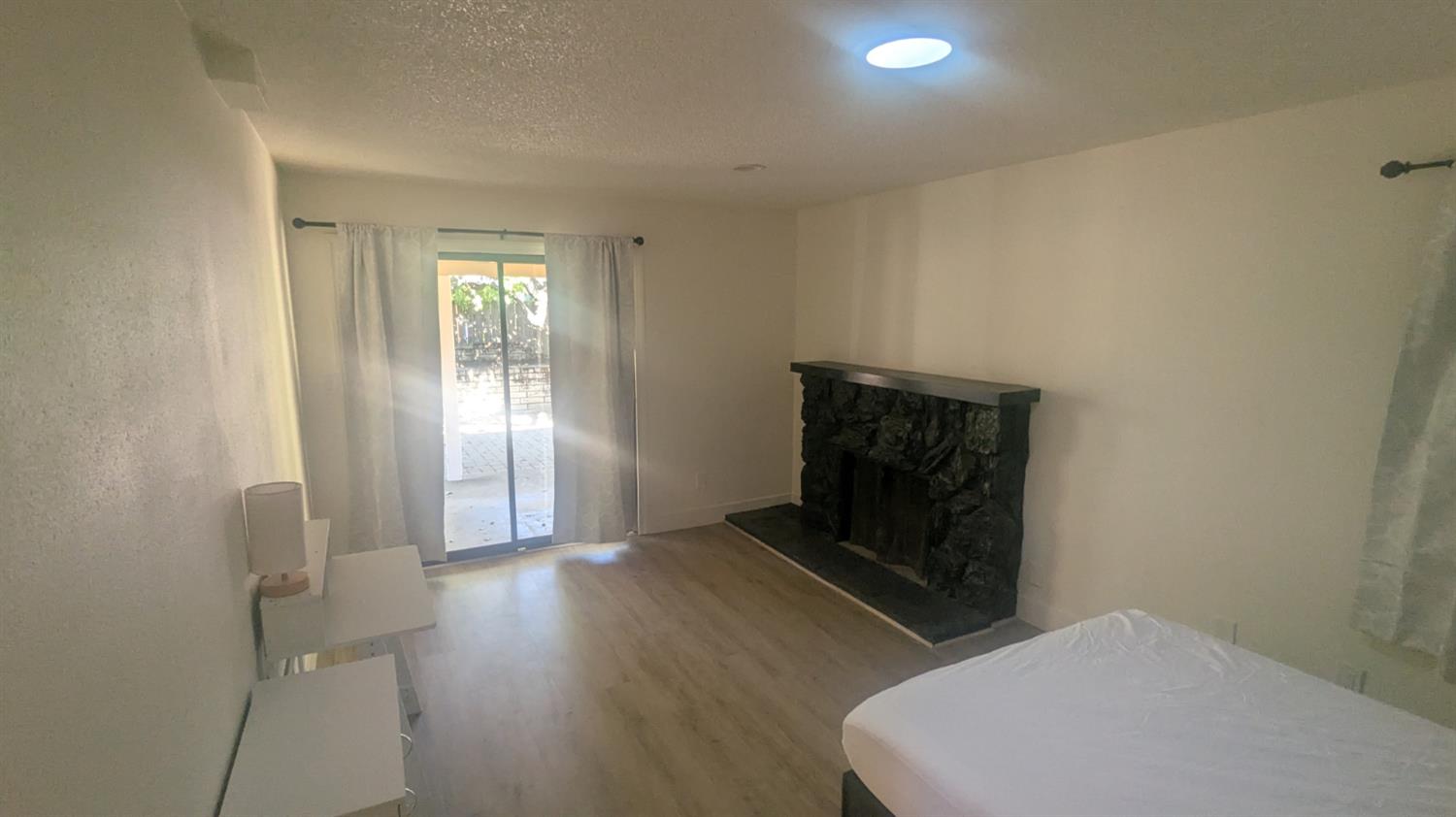 6851 Albury Street Citrus Heights, CA 95621 - Photo 8 of 22 a view of an empty room and wooden floor