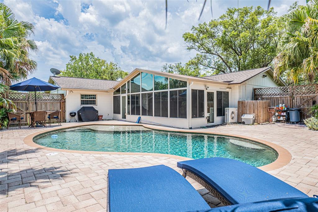 741 Brookside Road Maitland, FL 32751 - Photo 41 of 43 a view of a swimming pool with a patio