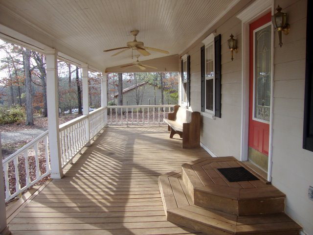 31 Anderson Road Forsyth, GA 31029 - Photo 2 of 8 a view of a porch with wooden floor and outdoor space