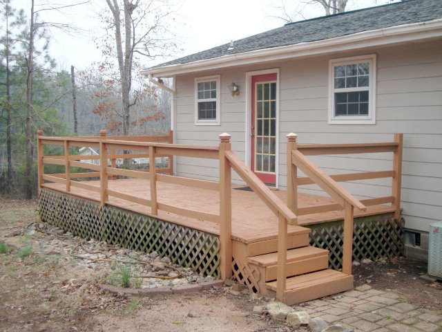 31 Anderson Road Forsyth, GA 31029 - Photo 5 of 8 a view of a house with a wooden deck