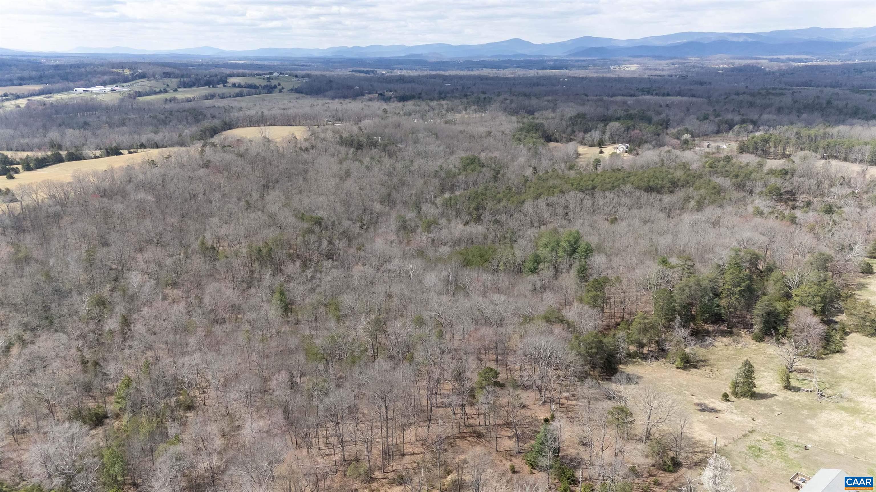 0 Elly Road Aroda, VA 22709 - Photo 7 of 34 a view of a lake with mountains in the background
