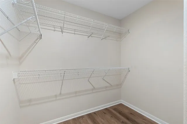 a view of a room with racks on the wall