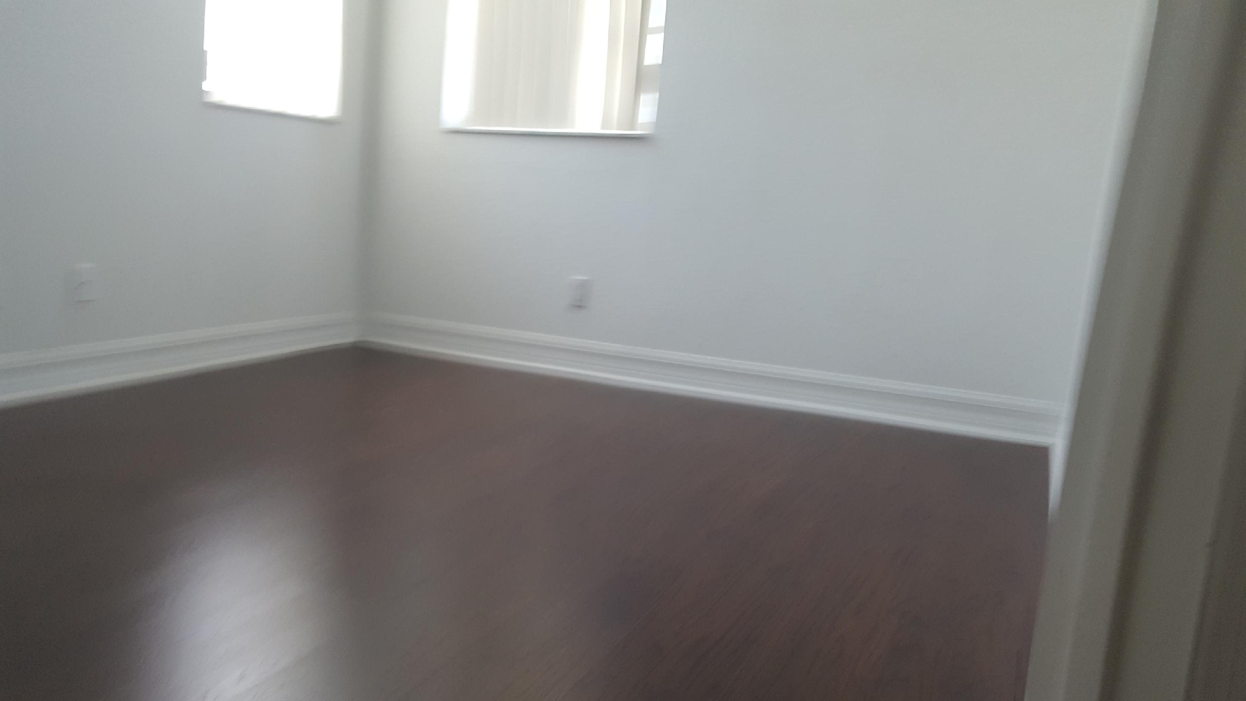 1865 Northwest 12th Street Boca Raton, FL 33431 - Photo 15 of 18 a room that has a window in it