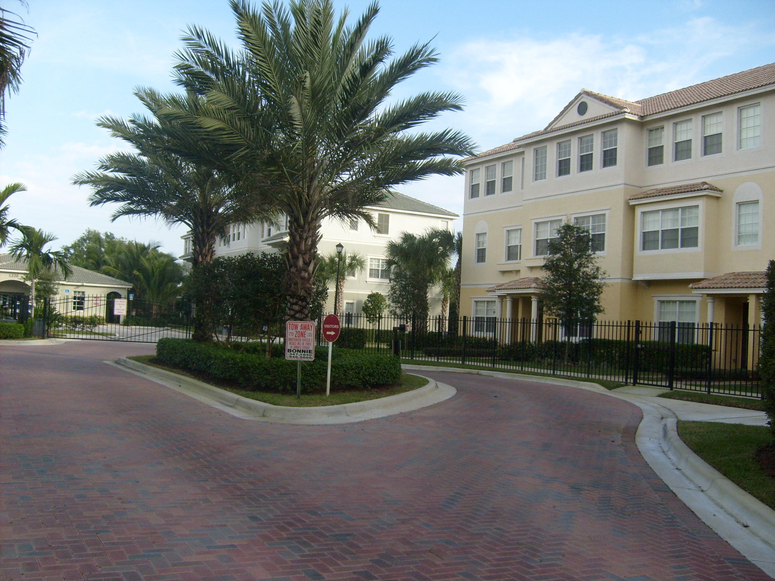 1865 Northwest 12th Street Boca Raton, FL 33431 - Photo 2 of 18 a front view of house with yard and green space