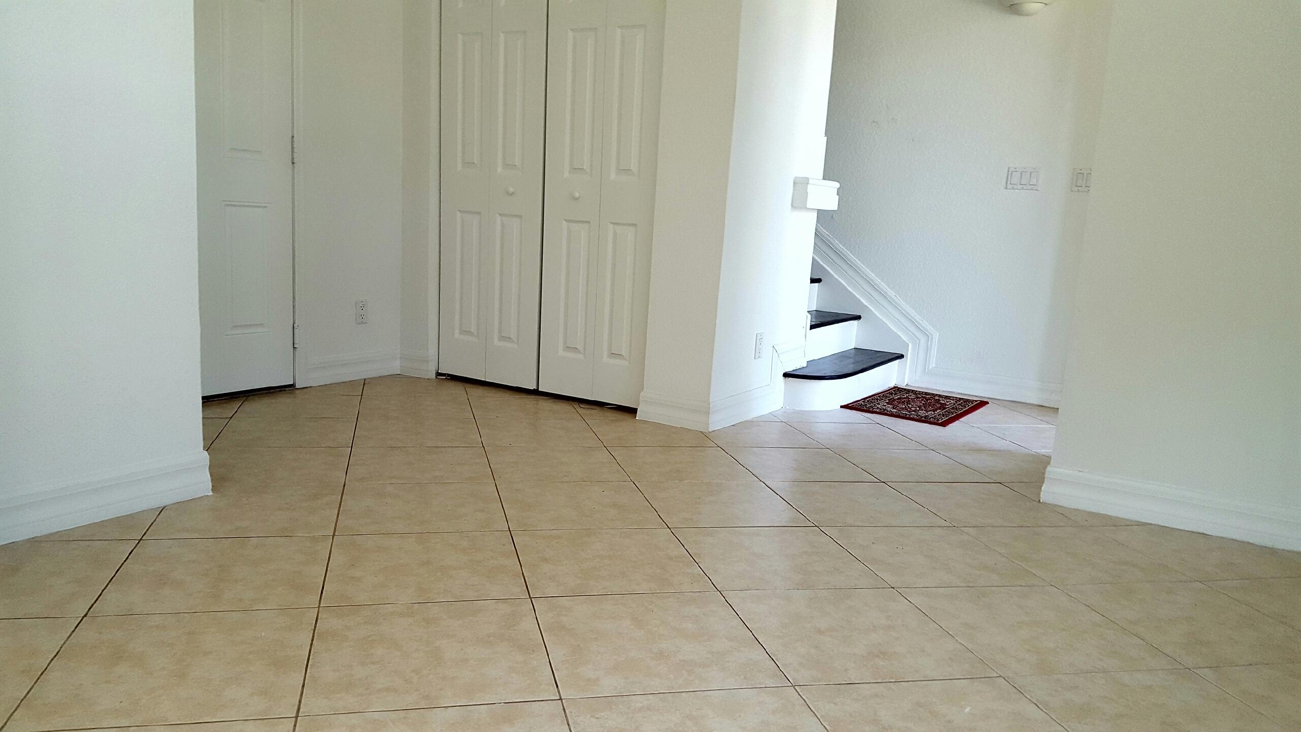 1865 Northwest 12th Street Boca Raton, FL 33431 - Photo 9 of 18 a view of an empty room with stairs