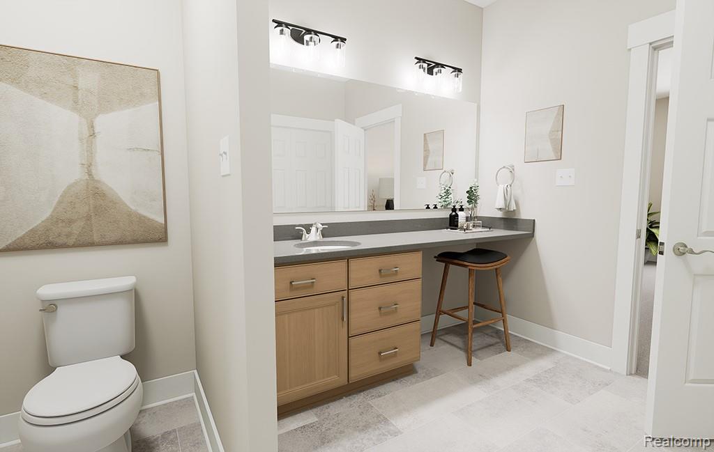 61634 Empire Road South Lyon, MI 48178 - Photo 15 of 18 Bathroom with vanity and light tile patterned flooring