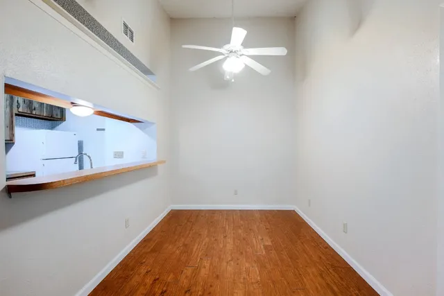 a view of a room with racks on the wall