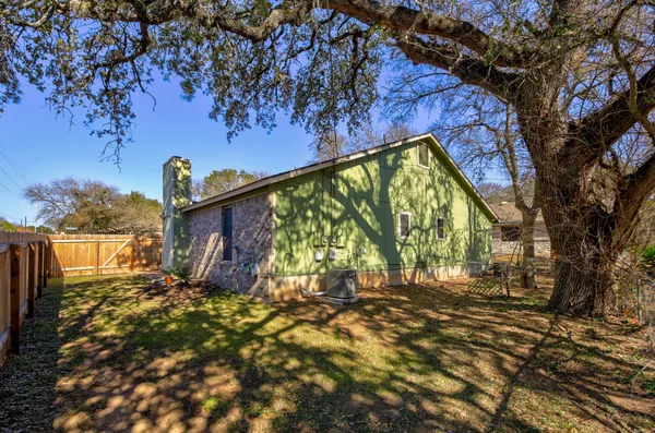 a view of backyard with green space