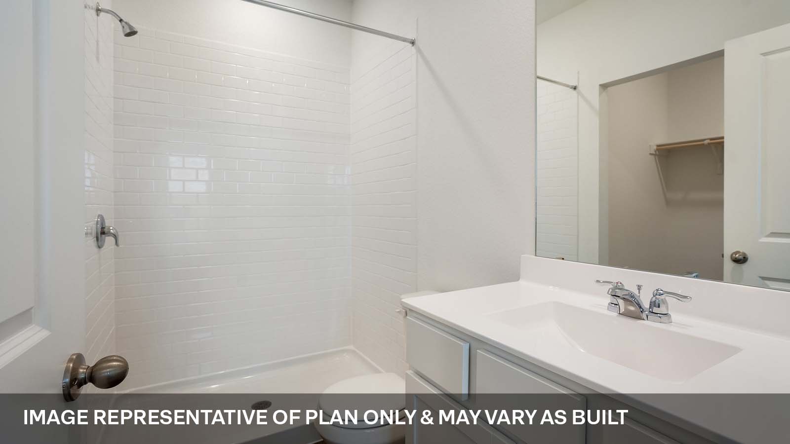 231 B Harrison Crossing Kyle, TX 78640 - Photo 12 of 19 a bathroom with a sink a toilet and a mirror