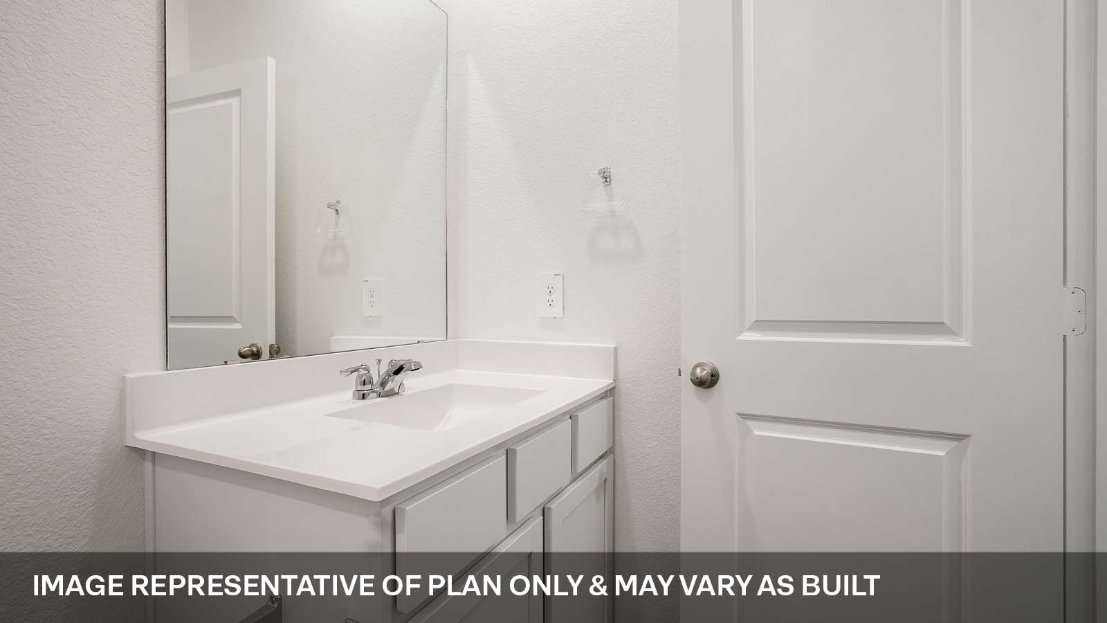 231 B Harrison Crossing Kyle, TX 78640 - Photo 16 of 19 a bathroom with a sink and a mirror