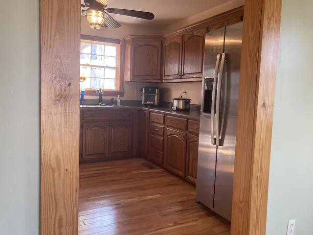 a kitchen with a stove and a microwave