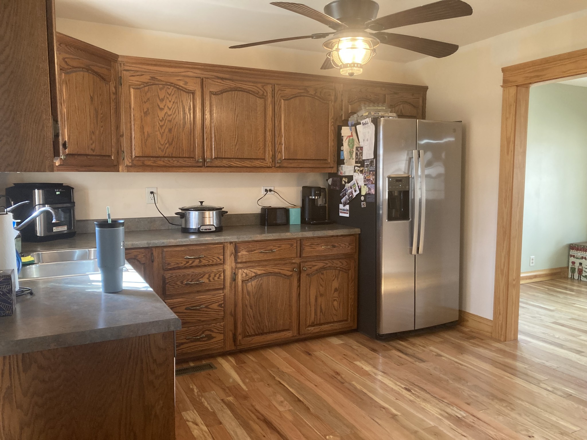 95 CC Road Lawrenceburg, TN 38464 - Photo 16 of 26 a kitchen with stainless steel appliances granite countertop a refrigerator a sink and dishwasher
