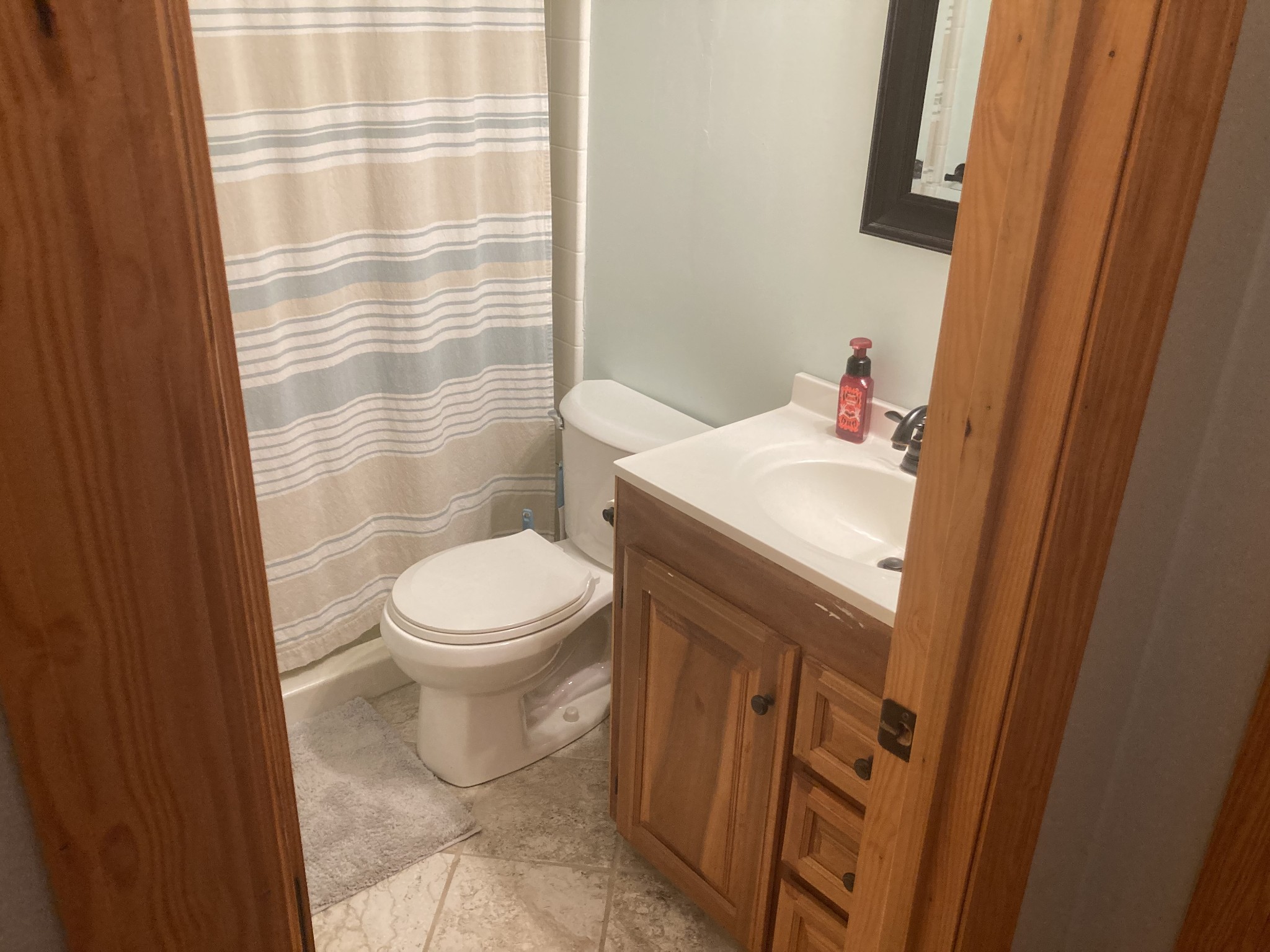 95 CC Road Lawrenceburg, TN 38464 - Photo 18 of 26 a bathroom with a sink a toilet and a shower
