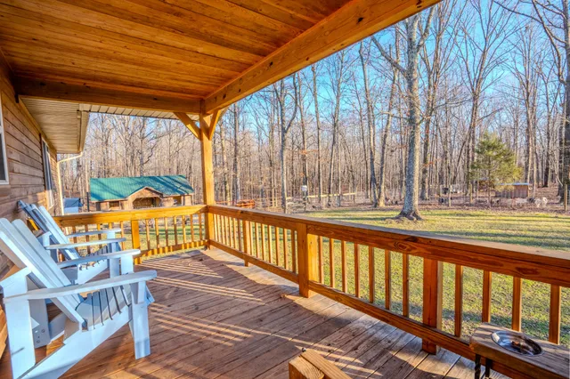 a view of swimming pool with outdoor seating