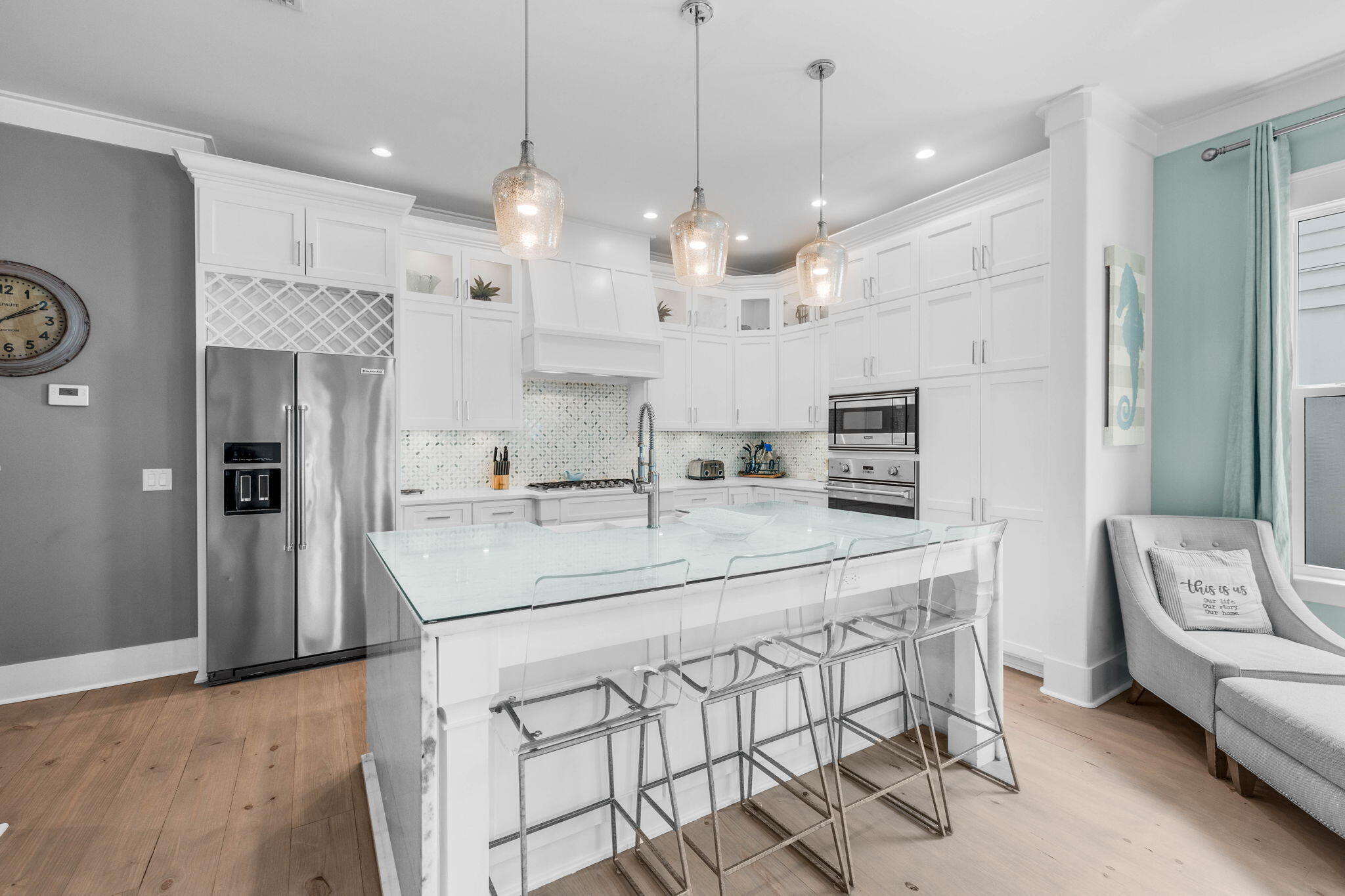 52 Pine Crest Circle Inlet Beach, FL 32461 - Photo 15 of 49 a kitchen with stainless steel appliances kitchen island granite countertop a sink and a refrigerator