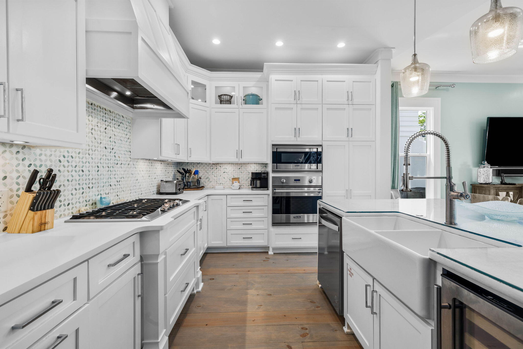 52 Pine Crest Circle Inlet Beach, FL 32461 - Photo 18 of 49 a kitchen with stainless steel appliances sink stove refrigerator and cabinets