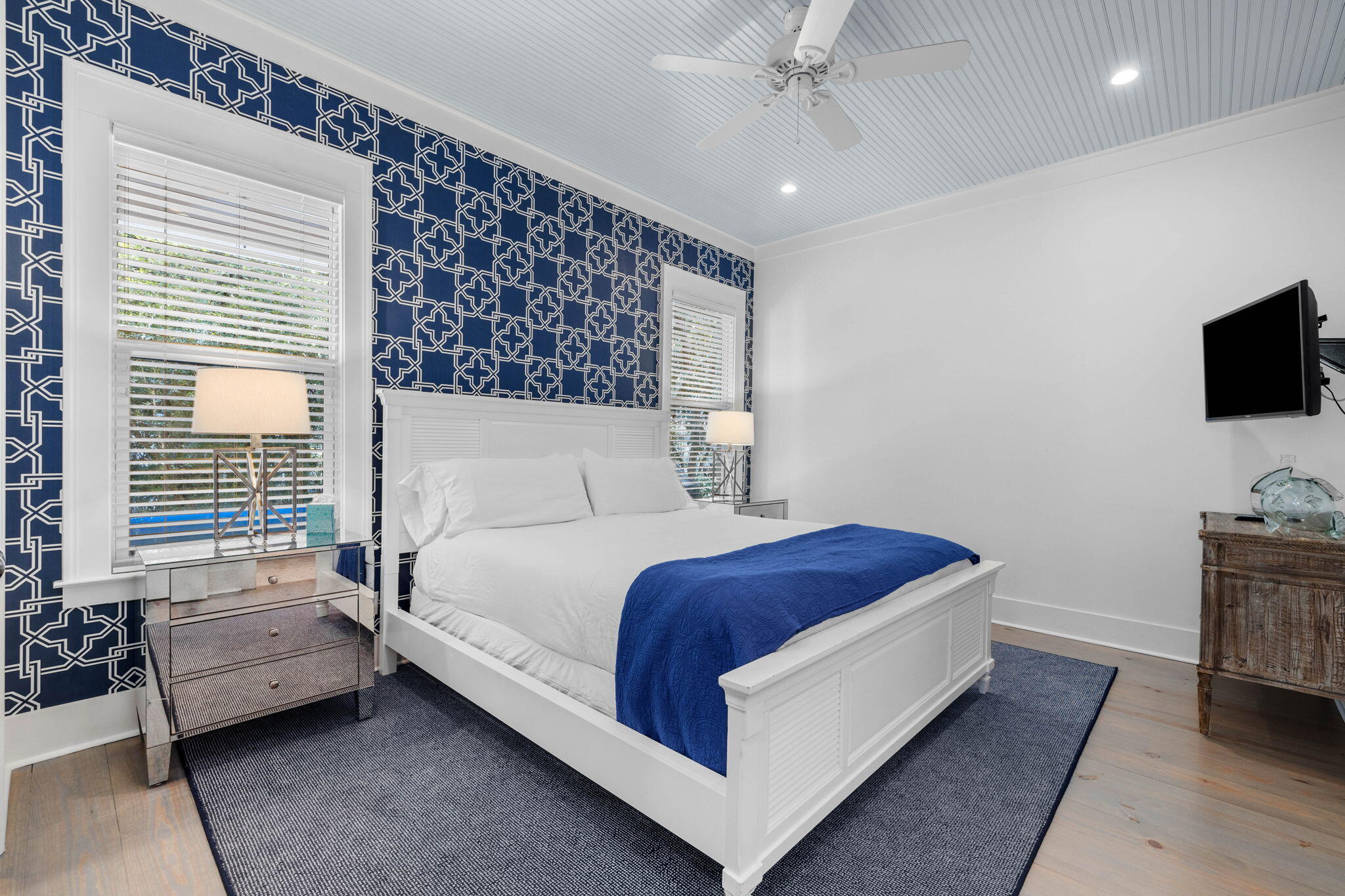 52 Pine Crest Circle Inlet Beach, FL 32461 - Photo 23 of 49 a bedroom with a bed and a flat screen tv