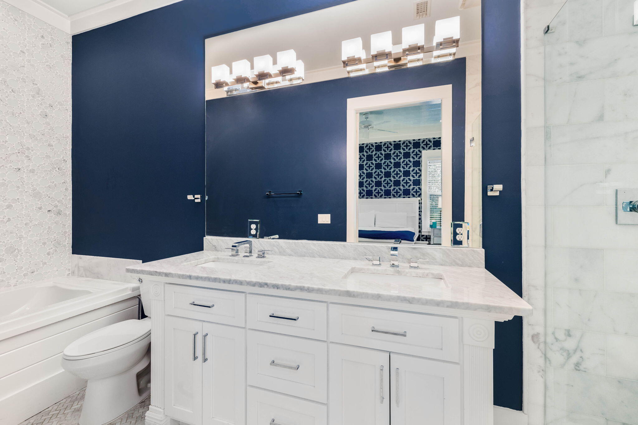 52 Pine Crest Circle Inlet Beach, FL 32461 - Photo 25 of 49 a bathroom with a sink vanity and a mirror