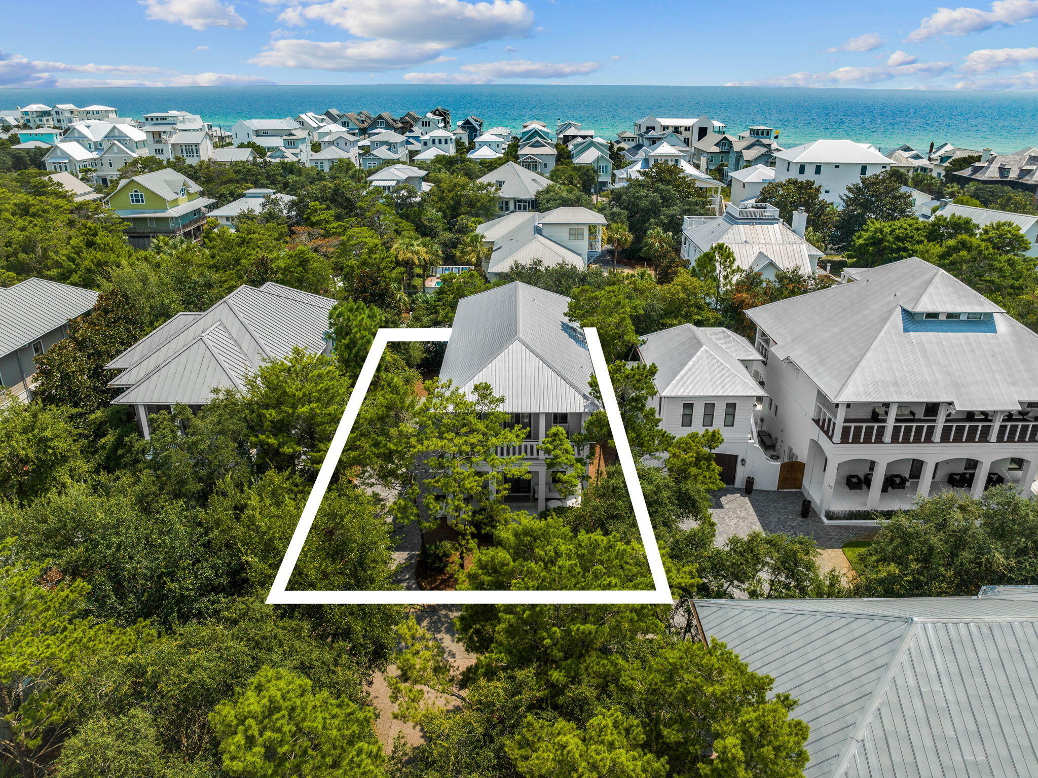 52 Pine Crest Circle Inlet Beach, FL 32461 - Photo 3 of 49 an aerial view of multiple houses with a yard