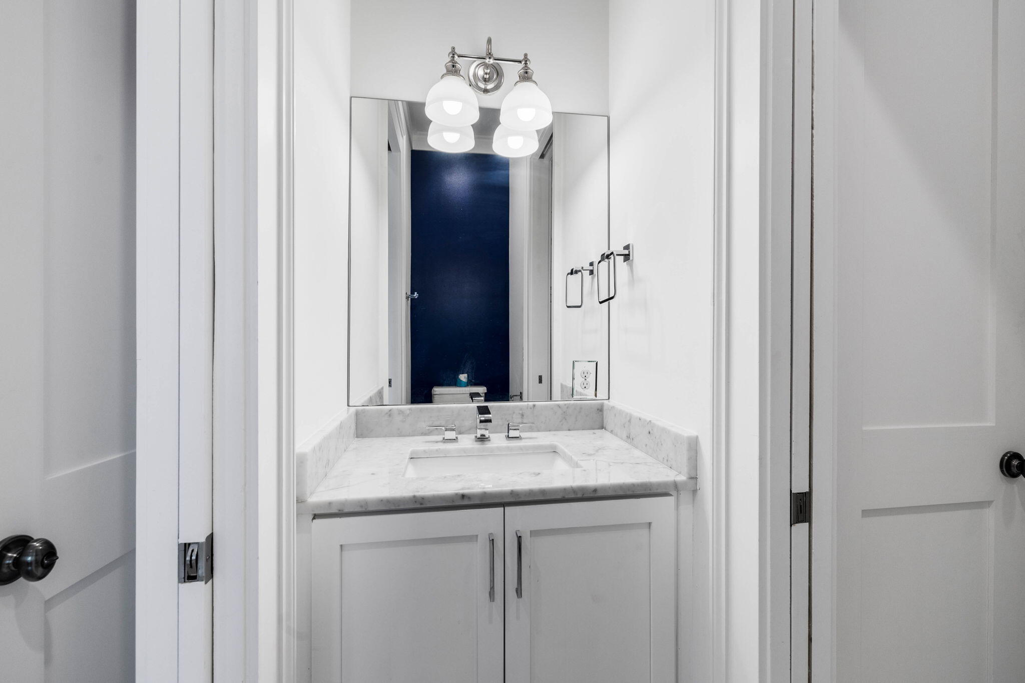 52 Pine Crest Circle Inlet Beach, FL 32461 - Photo 35 of 49 a bathroom with a sink and a mirror