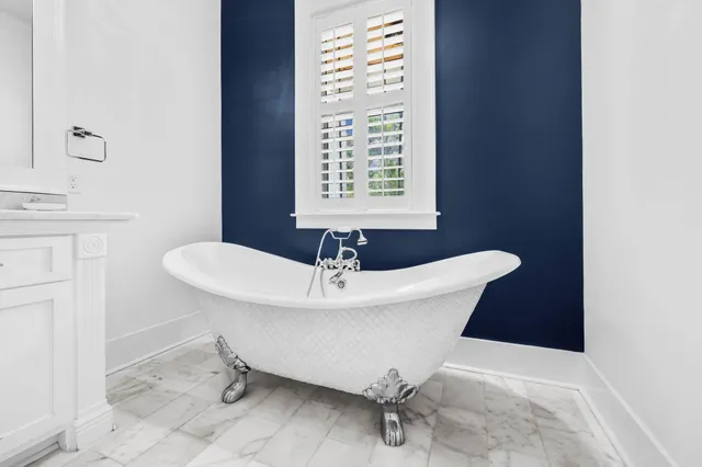 a bathroom with a sink and a bathtub