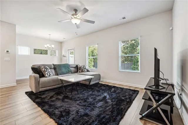 a living room with a couch and a window