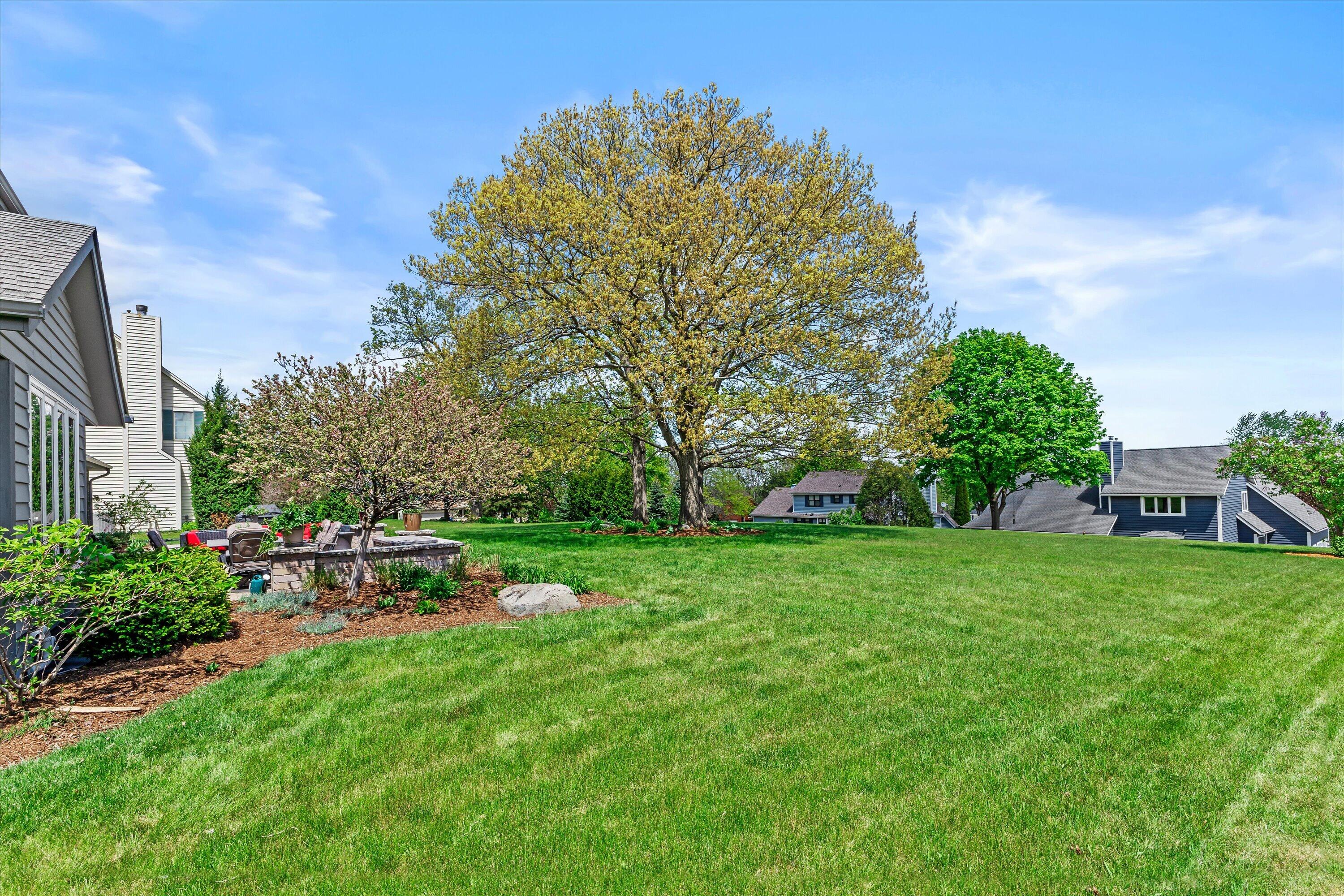 W168N5140 Stonefield Road Menomonee Falls, WI 53051 - Photo 45 of 49 Plenty of green space for pets and play!