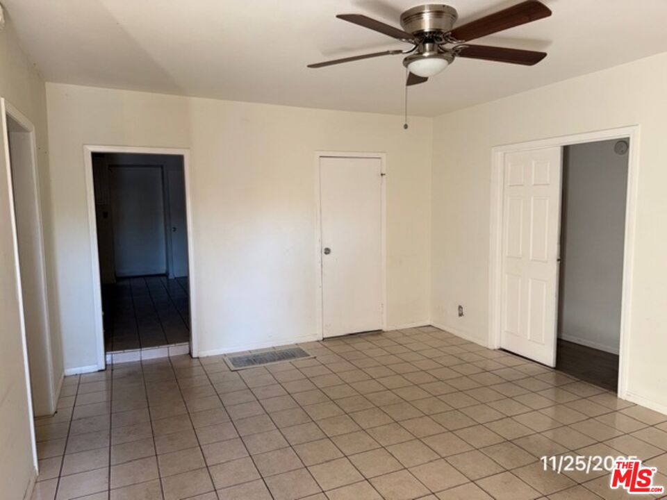 1740 South Rimpau Boulevard Los Angeles, CA 90019 - Photo 8 of 18 a view of an empty room