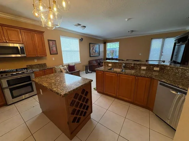 $920,000 | 5902 Southwest 166th Court, Miami, FL 33193