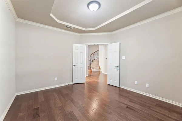 a view of a livingroom with wooden floor