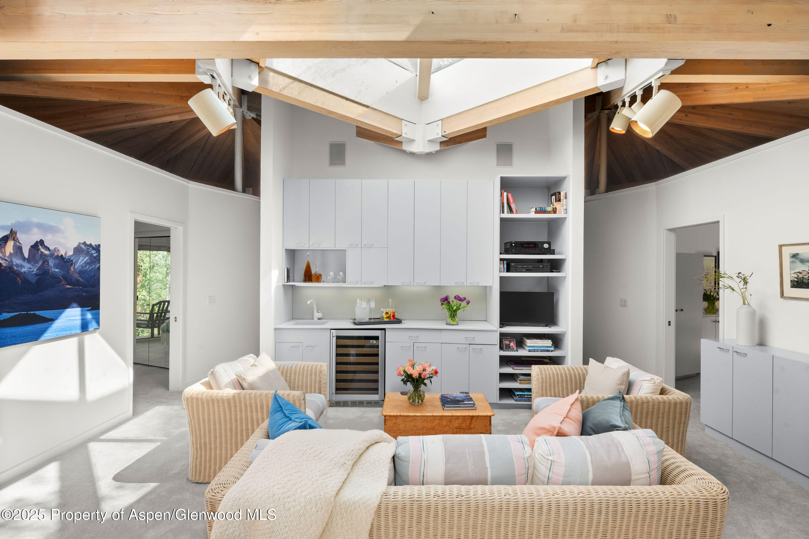 239 Antler Ridge Lane Snowmass Village, CO 81615 - Photo 12 of 50 a living room with furniture and a lamp