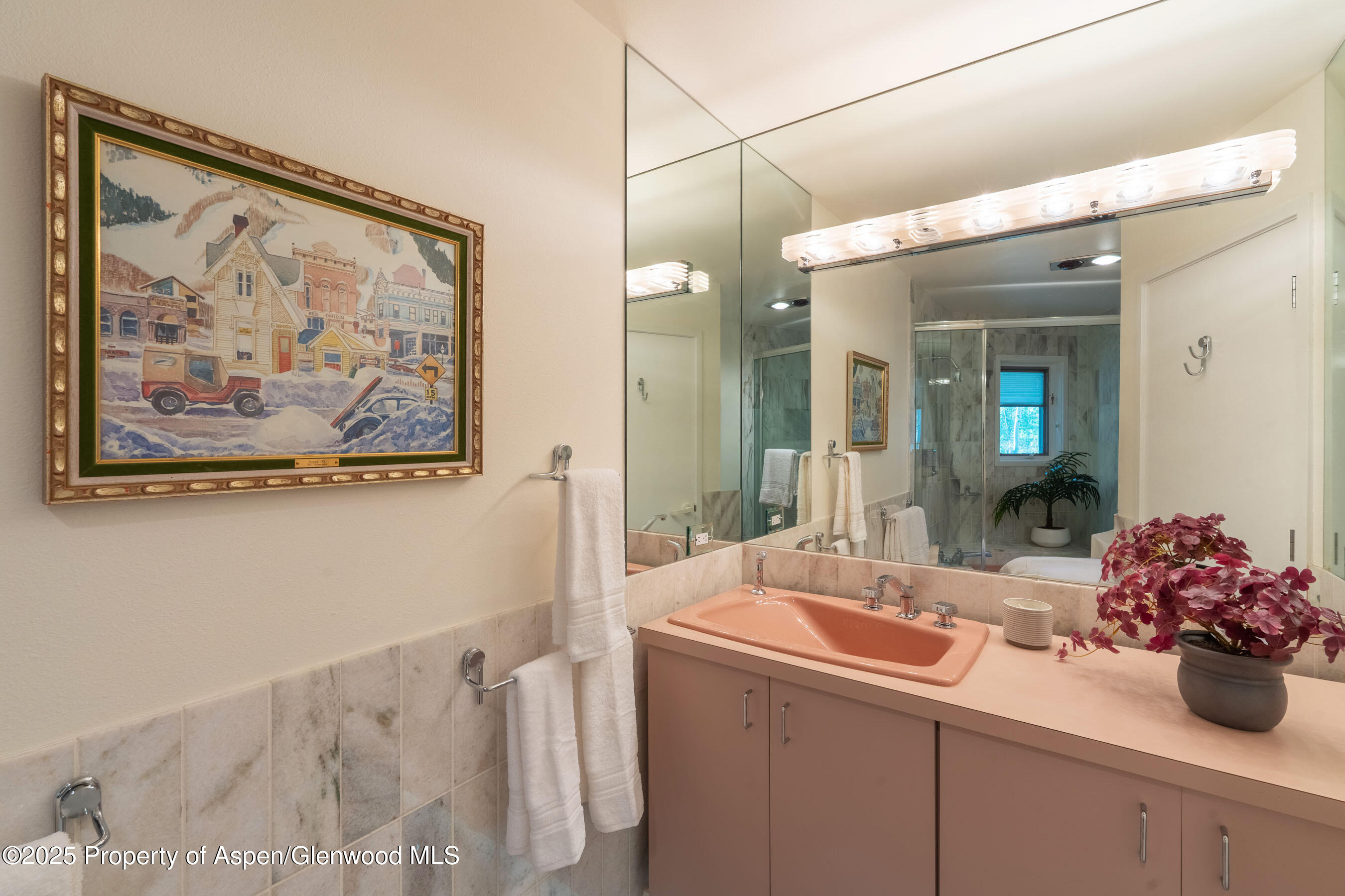 239 Antler Ridge Lane Snowmass Village, CO 81615 - Photo 23 of 50 a bathroom with a sink mirror and vanity